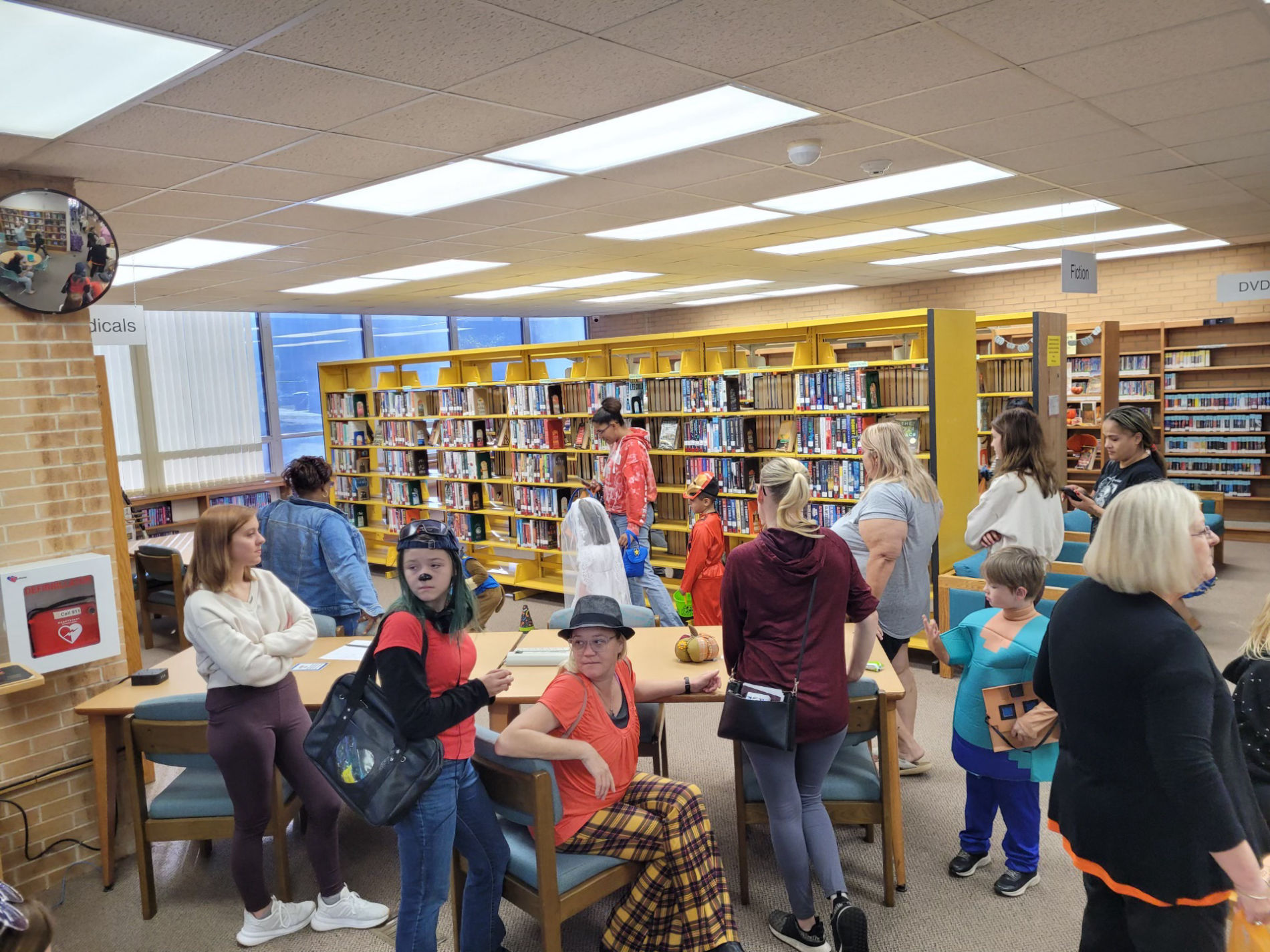 Children and families enjoying Halloween party activities