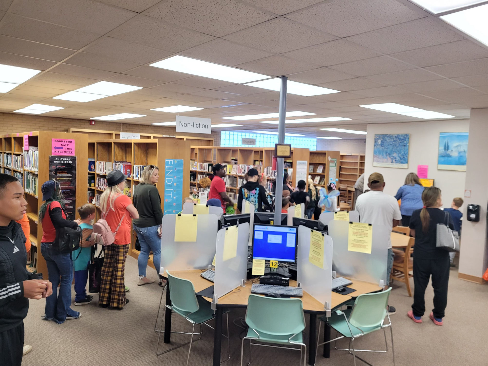 Children and families enjoying Halloween party activities