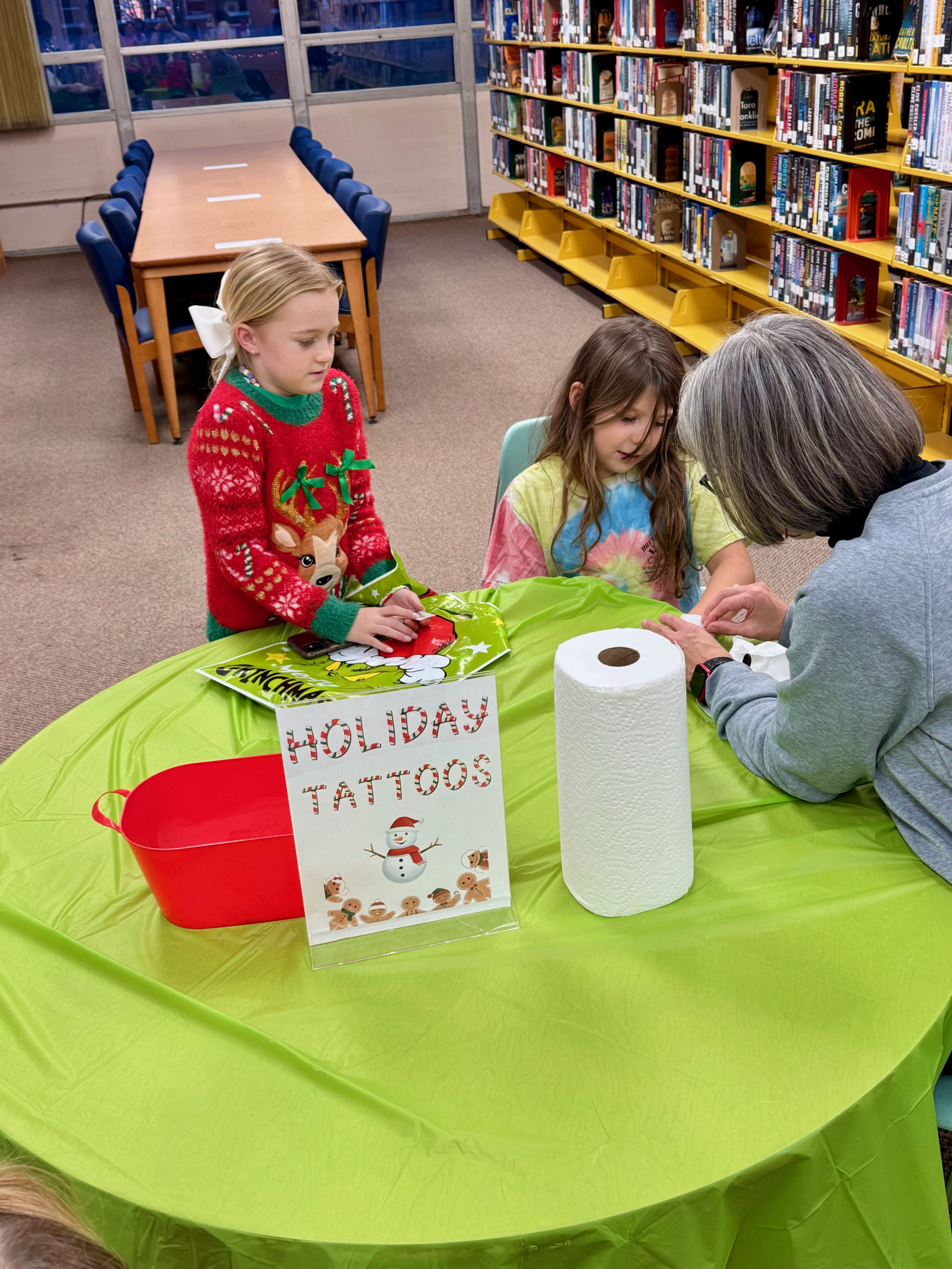 Kids enjoying a Grinchmas party at the library