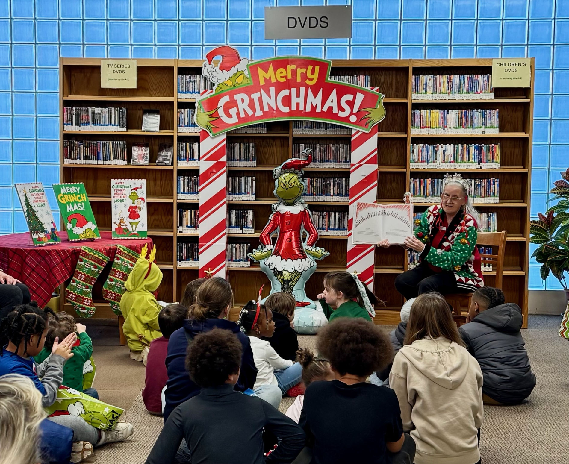 Kids enjoying a Grinchmas party at the library
