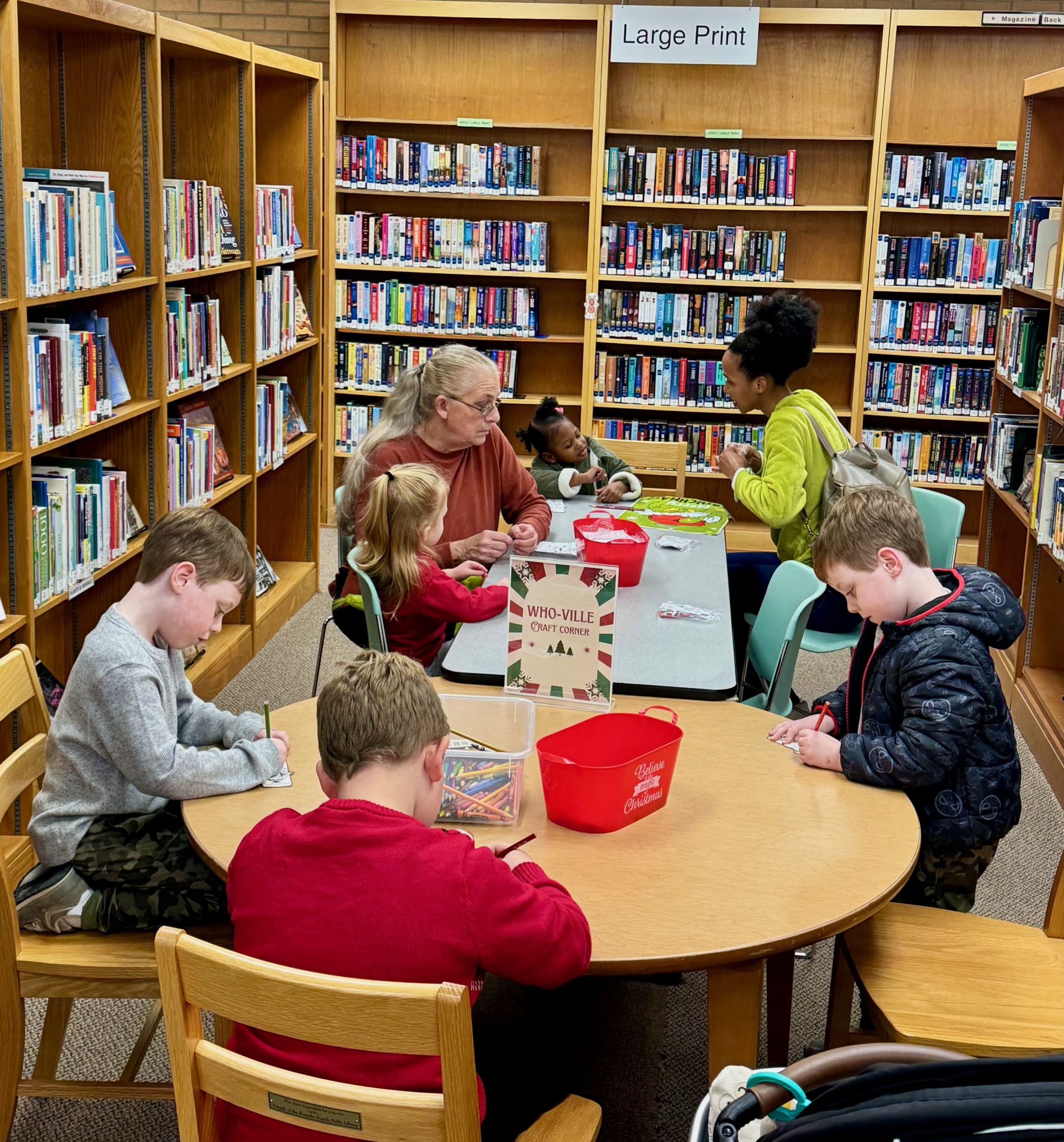 Kids enjoying a Grinchmas party at the library