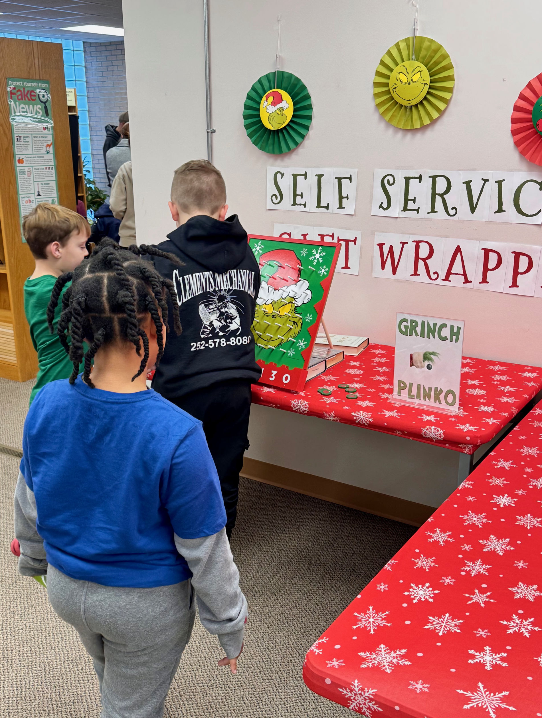 Kids enjoying a Grinchmas party at the library