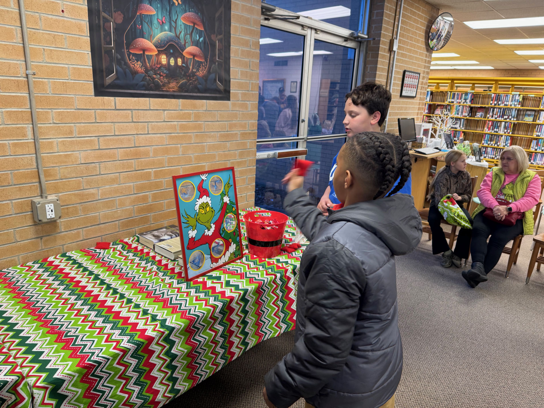 Kids enjoying a Grinchmas party at the library