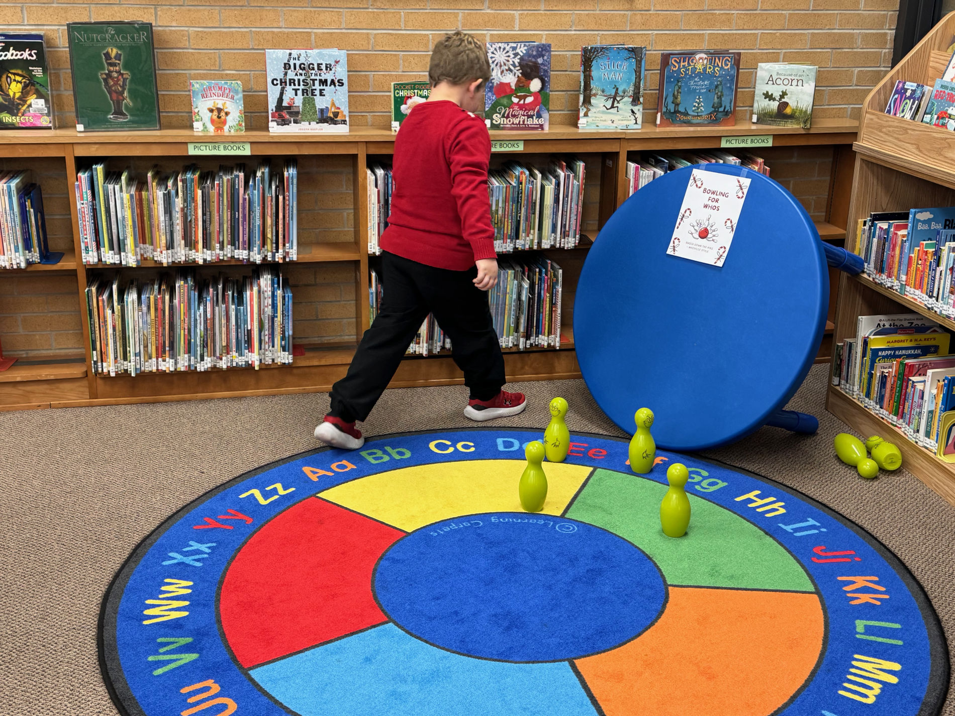 Kids enjoying a Grinchmas party at the library