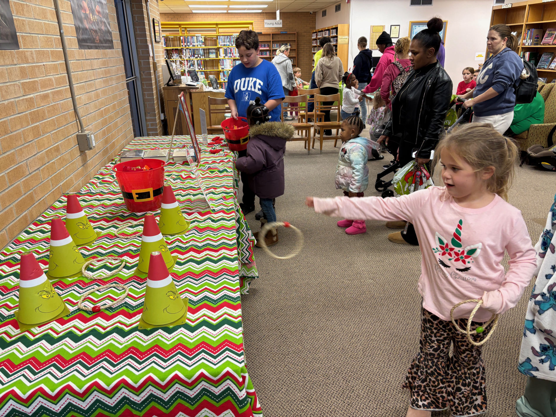 Kids enjoying a Grinchmas party at the library
