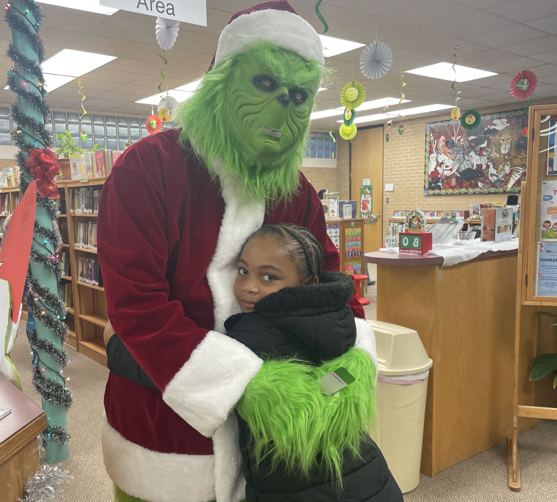 Kids enjoying a Grinchmas party at the library