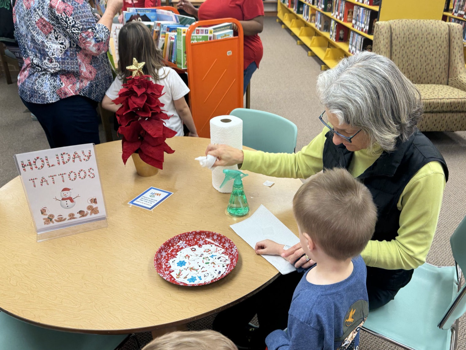 Kids enjoying a Grinchmas party at the library