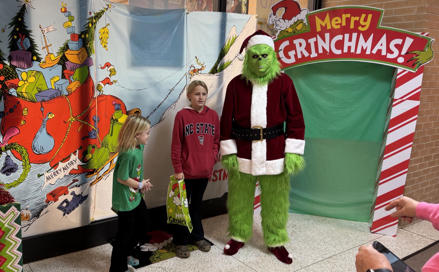 Kids enjoying a Grinchmas party at the library