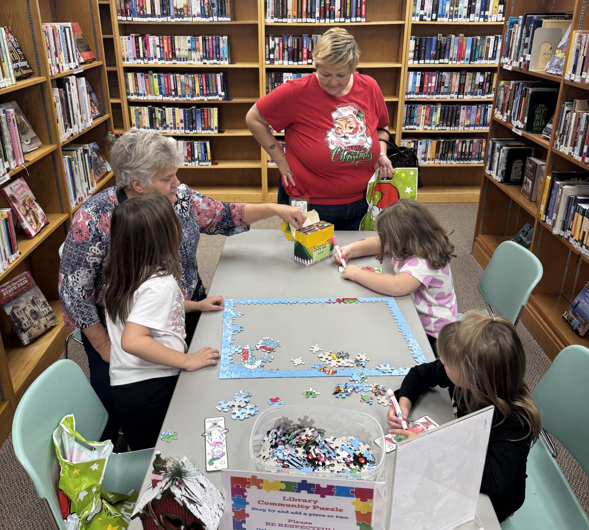 Kids enjoying a Grinchmas party at the library
