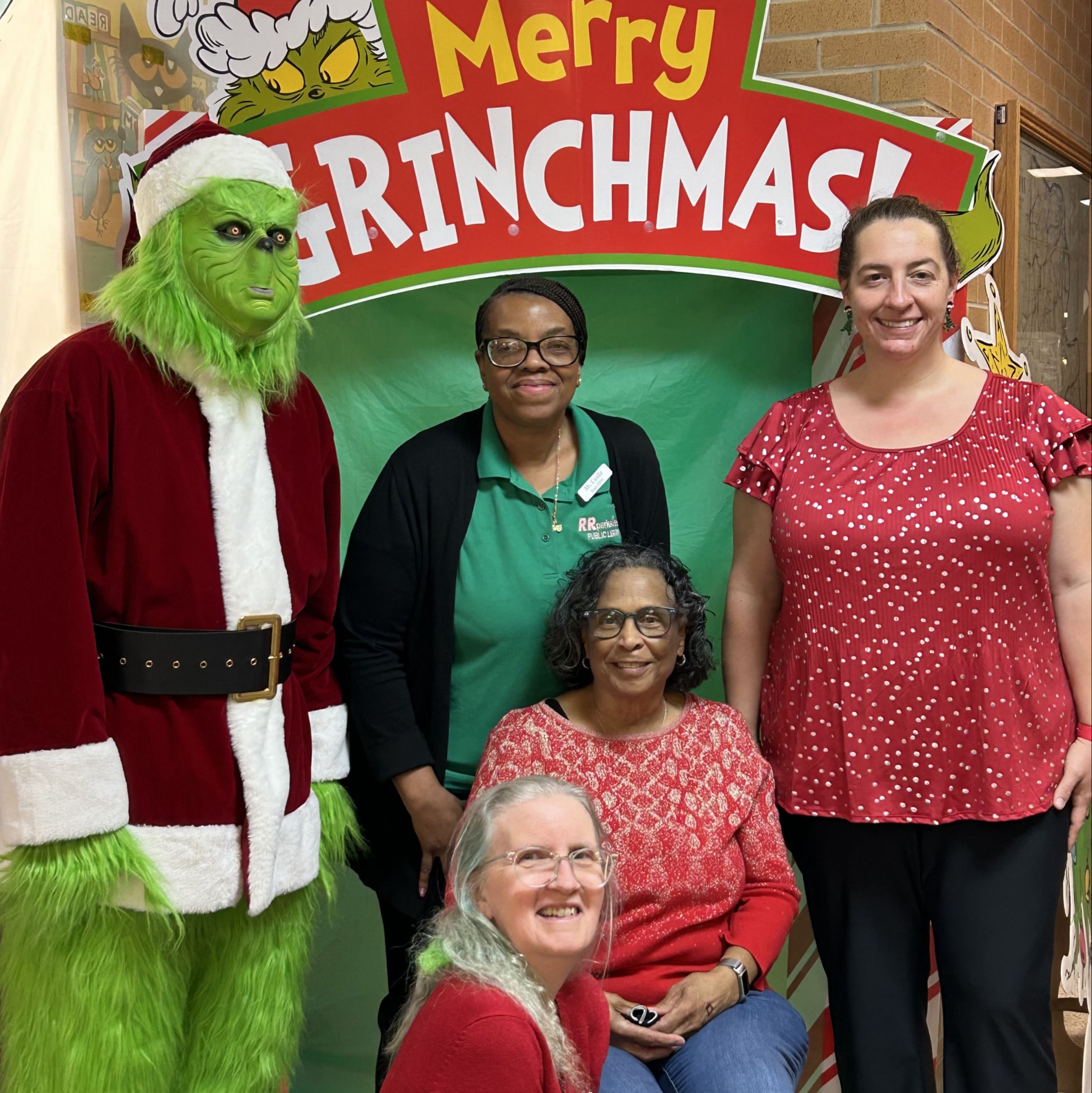 Kids enjoying a Grinchmas party at the library